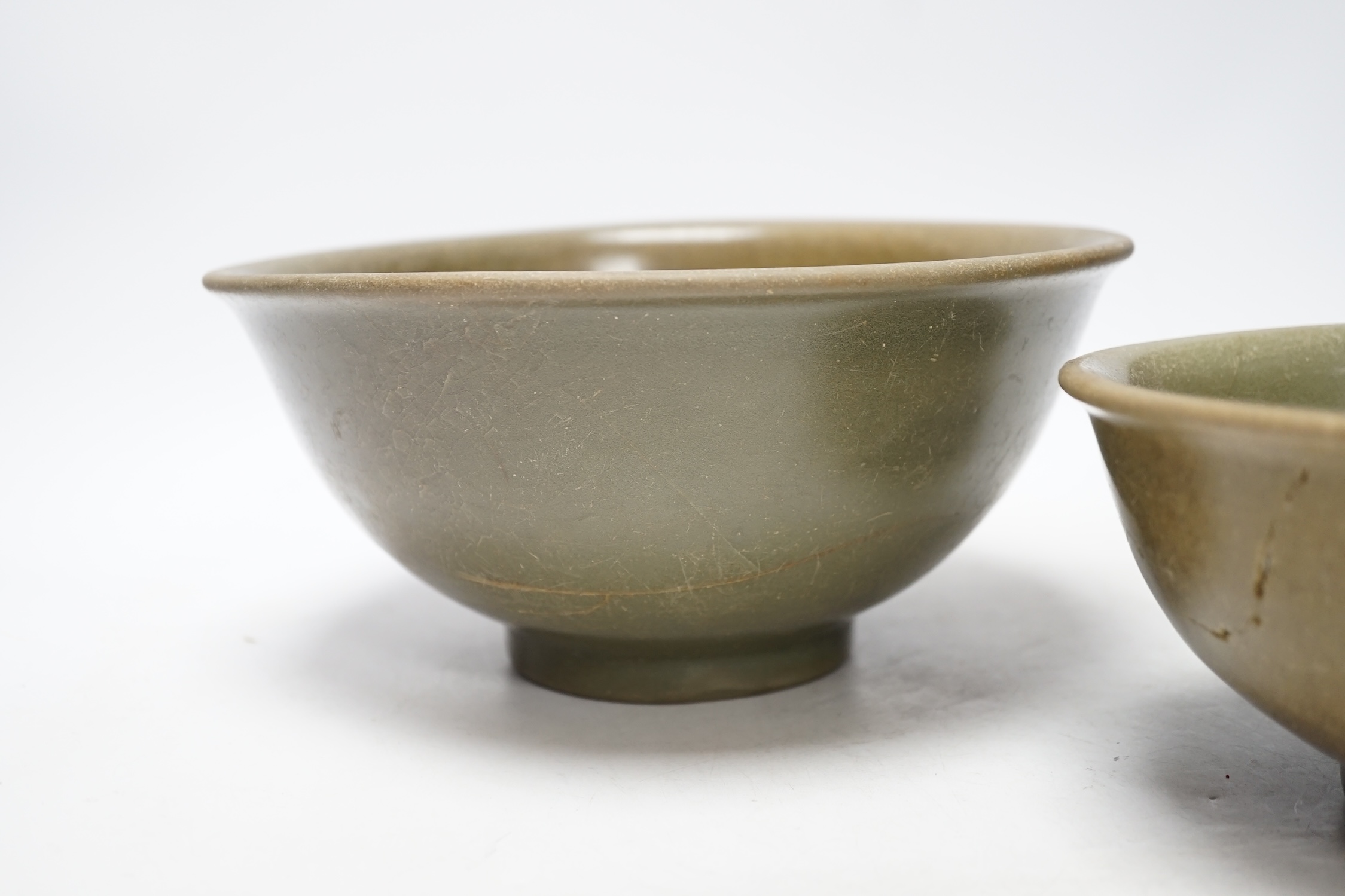 Two Chinese celadon bowls, Yuan-Ming dynasty, largest 22.5cm diameter